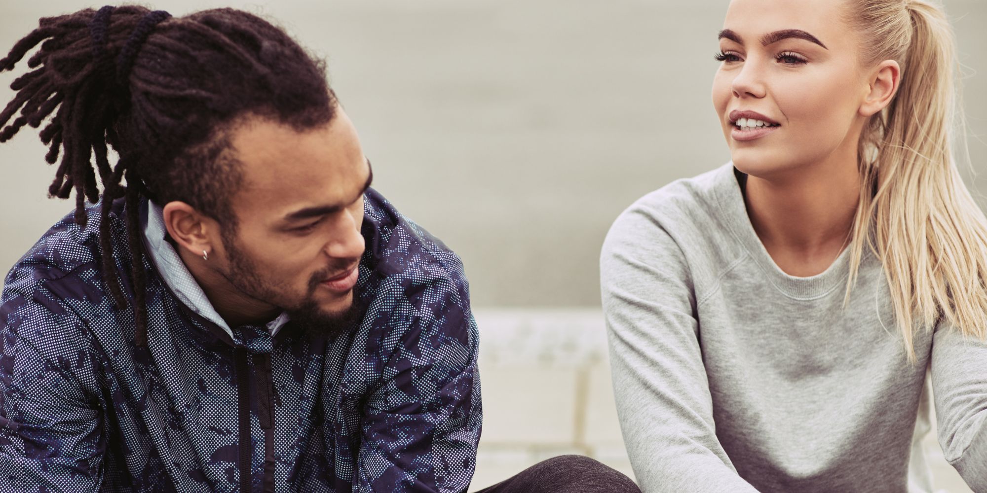 Man and woman talking about getting an abortion.